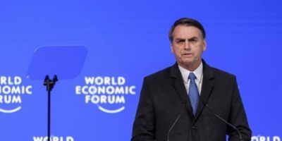 "Vamos restaurar nossos valores e abrir nossa economia", afirma Bolsonaro em Davos