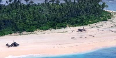 Homens são resgatados de ilha do Pacífico após escreverem 'SOS' na areia