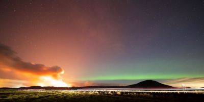 Em registro raro, brasileiros fotografam aurora boreal e erupção vulcânica na Islândia