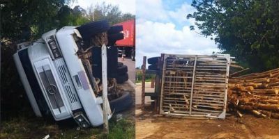 Caminhão carregado com toras de madeira tomba na esquina de Tapes