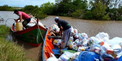 Defesa Civil entrega alimentos aos moradores da Ilha Santo Antônio em Camaquã